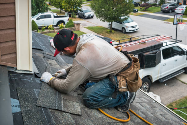 Professional Storm Damage Roof Repair technician working in Corning, NY